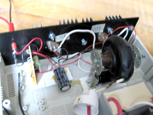 Interior of the DIY/homemade 30kV high voltage power supply showing the transistor wiring.