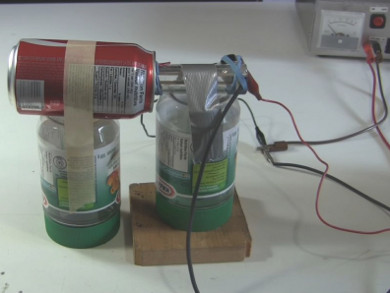 Homemade/DIY Van de Graaff generator with an open Coke soda can for the dome.