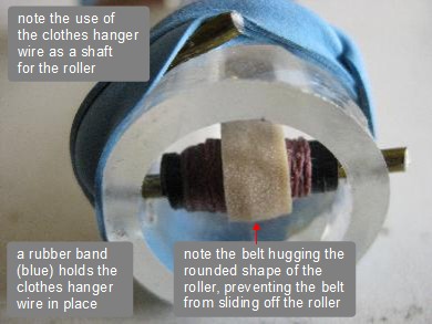 Van de Graaff generator roller held in place with a piece of clothes hanger wire.