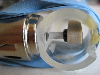 Vinyl tube with vinyl tape wrapped around it for a Van de Graaff generator roller. The tube fits tightly onto the motor shaft.