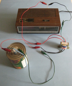 The radio wired up to the doorbell transformer and from there to the rochelle salt piezoelectric crystal speaker.