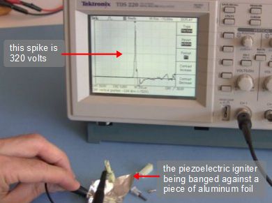 Testing the piezoelectric crystal from the lighter using an oscilloscope.