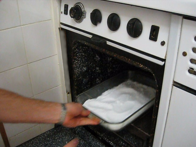 Step 2 in making rochelle salt piezoelectric crystal, put the baking soda in an oven.