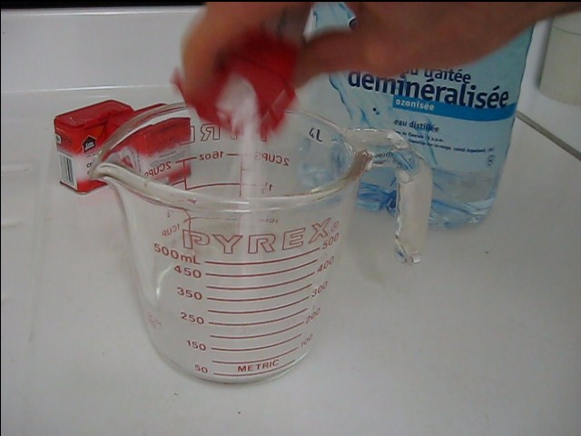 Step 1. Pour the cream of tartar into a Pyrex container.
