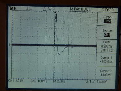 Oscilloscope output showing time for two spikes of piezoelectric rochelle salt crystal test.