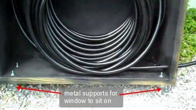 Metal supports for the window to sit on.