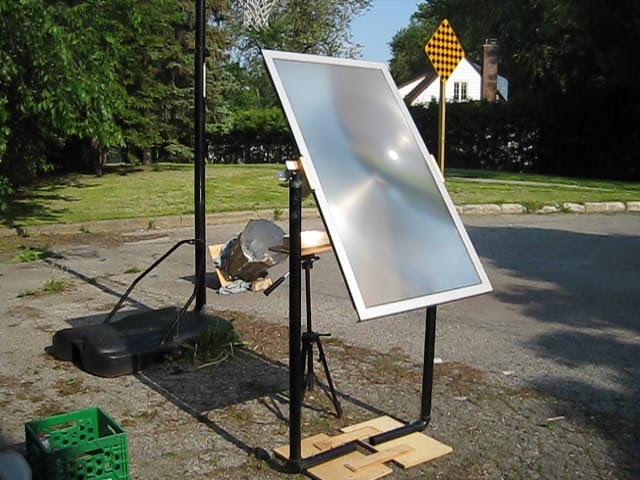 Fresnel lens solar cooker, the lens taken from a rear projection TV.