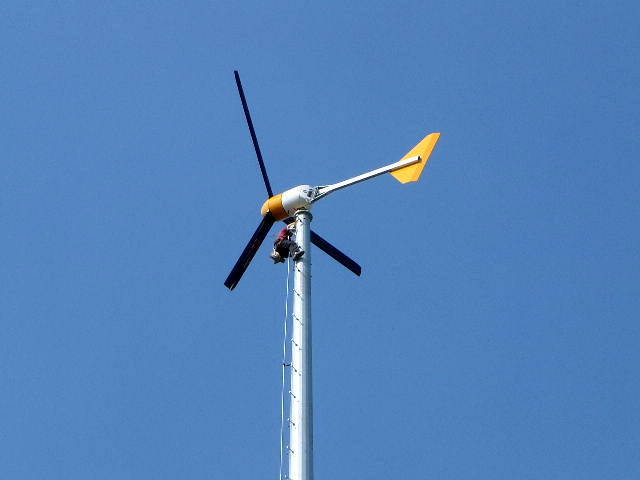 Closeup of the top of the wind turbine.