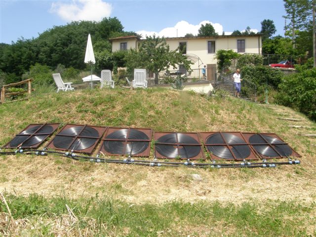 DIY/homemade solar pool heating in Tuscany.