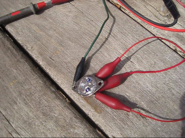 2N3055 transistor homemade solar cell wired up outdoors in sunlight.
