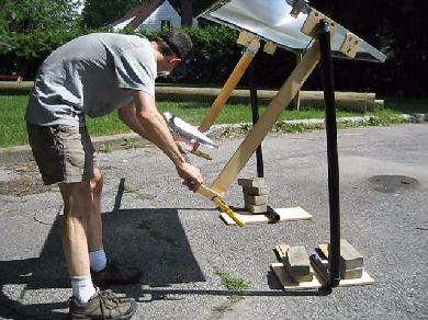 Mini solar tower test setup showing the fresnel lens.