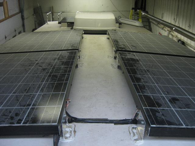 Solar panels on the roof of the motor home.