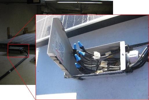 Combining wires from the solar panels in the cable connection box.