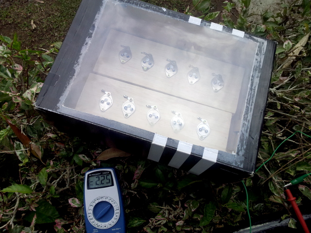 Solar panel made of 2N3055 transistor solar cells in a box.