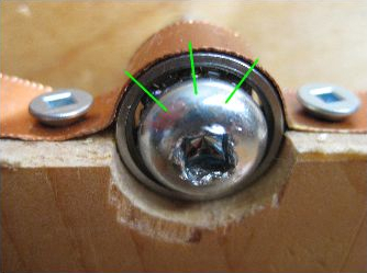 Electrical path through a bearing in a ball bearing motor.