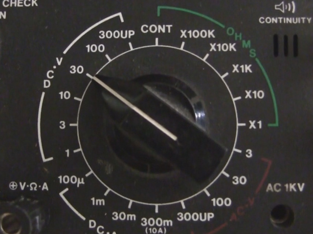 The meter dial while measuring the voltage for the smoke precipitator.