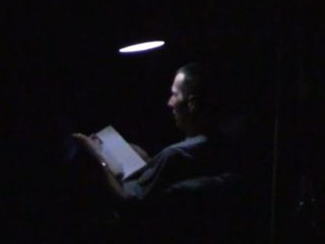 Reading by the light from the homemade/DIY gravity light.