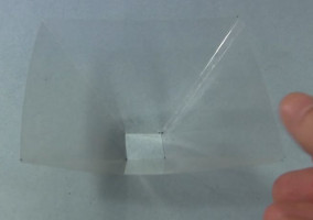 The plastic pyramid for showing holograms.
