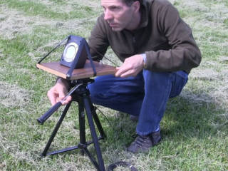 Me with a photophone mounted on a tripod aiming it.