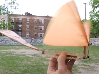 The shape of the ornithopter's wing material with the wings up.