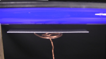 The UV lamp close to the zinc plate for demonstrating the photoelectric effect.