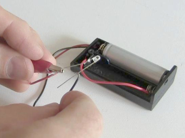 Showing that with the LED connected directly to the battery, there isn't enough voltage to run the LED.