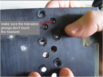 Avoid shorting out the transistor prongs with the heatsink.