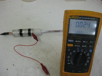 Measuring the capacitance of the barium titante and epoxy with
      the plastic cylinder mold still in place.