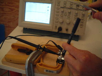 Piezoelectric rochelle salt crystal test setup.