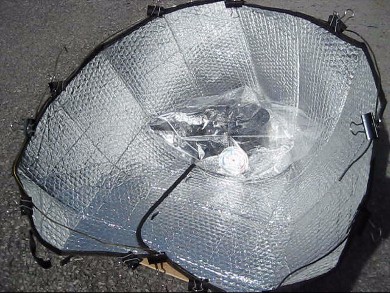 Car sunshade solar cooker highly optimized.