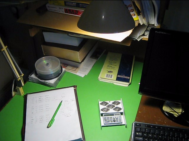 Using indoor lighting to test my solar panel made of solar cells made from 2N3055 power transistors for powering my calculator.