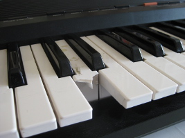 Broken piano/keyboard key before fixing.