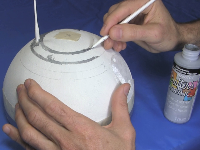 Painting BB-8's head.