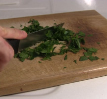 Chopping the spinach to make chlorophyll.