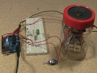 Arduino speech synthezier circuit sitting on a table.