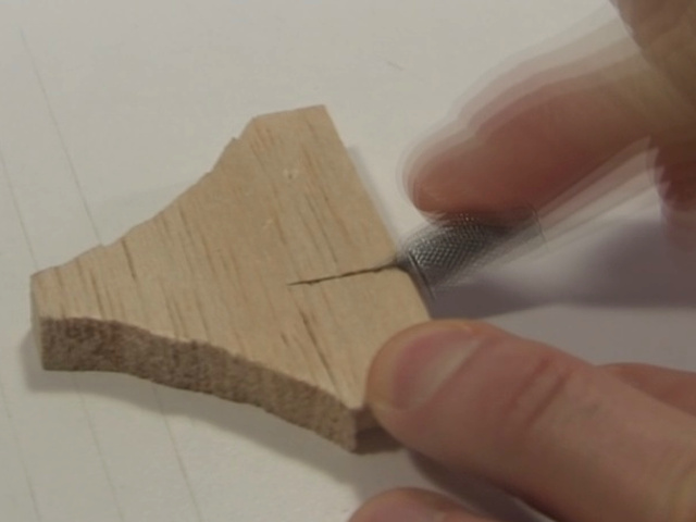 Cutting the wooden base for the ion wind rotor.