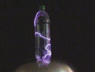 Lightning in a bottle on top of a Van de Graaff generator.