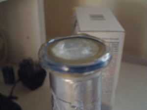 A paraffin wax plug is inserted in the cylinder while the
resin hardens on the vinyl tube.